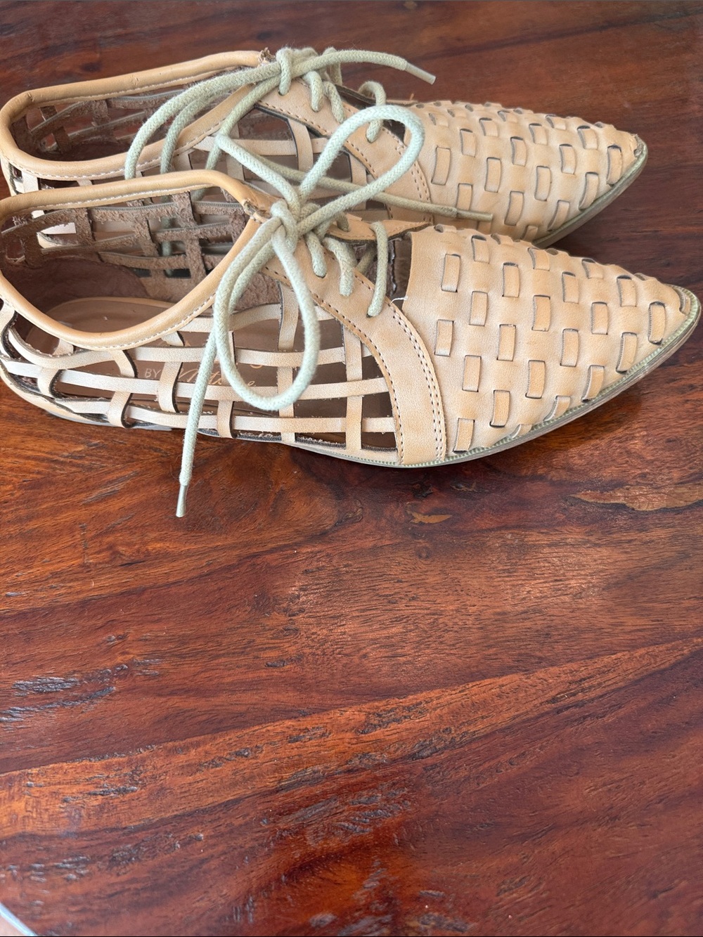 Coconuts by Matisse Woven Lace-Up Pointed Flats in Tan with Light Green Laces.